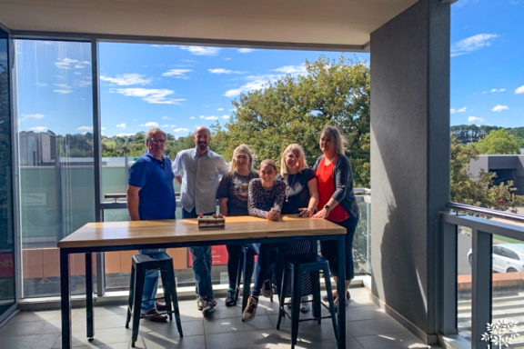 Intereach Gisborne staff members enjoying the view from their new office at the Nexus Centre